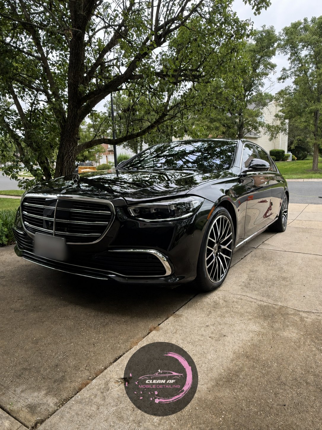 Clean AF detailed black vehicle parked outside